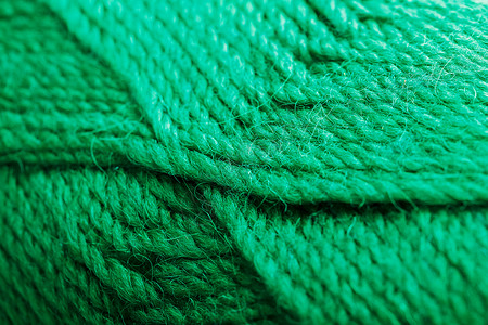 毛线缝合了五彩色的海藻丝线 在宏观中做针线背景图片