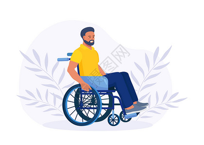 坐在轮椅上并握住轮子的残疾人 残疾的年轻人 残疾概念背景图片