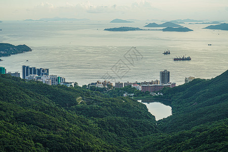 从维多利亚山峰看到香港日落的景色天文美景街景景观建筑群城市旅行港口商业金融图片