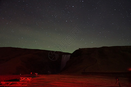 冰岛瀑布滑雪观光瀑布自然现象星星星空旅游宇宙天文学夜景夜空背景图片