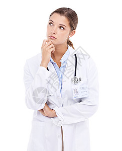 试图做一个简洁的诊断 深思熟虑的年轻女医生在白色上被孤立背景图片