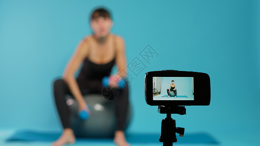 瑜伽视频提供健身辅导的照相机摄影训练员拍摄运动视频背景