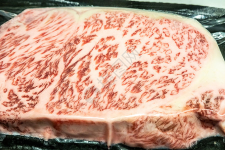 放射型花纹甲5型Wagyu A5型牛肉的许多部分含有高分辨率浮标纹理炙烤烧烤烹饪厨师晚餐大理石肉片餐厅牛肉盘子背景