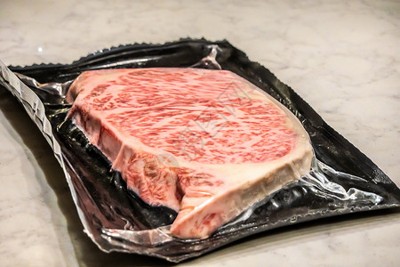 放射型花纹甲5型Wagyu A5型牛肉的许多部分含有高分辨率浮标纹理餐厅炙烤奢华肉片烧烤烹饪盘子牛肉生肉食物背景