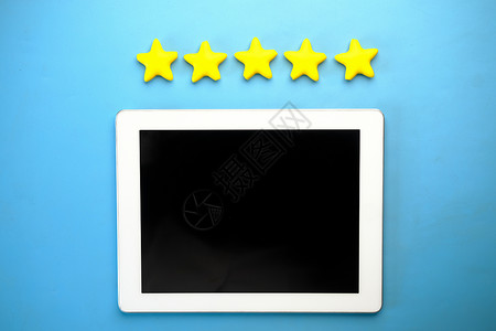 客户审查概念 对金星和数字平板的蓝色评级背景图片