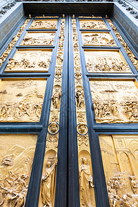 上帝之门佛罗伦萨天堂之门 佛罗伦萨洗礼堂的主要旧门位于大教堂前洗礼入口通道天空天堂出口艺术金子信仰宗教背景