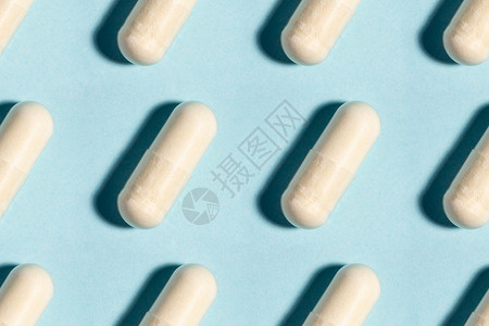 无缝医用药丸 药物胶囊模式 止痛药 维他命 抗生素 蓝底的预生素背景图片