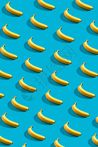 天空蓝底的香蕉种类繁多团体小吃艺术桌子皮肤糖果蓝色水果食物对角线背景图片