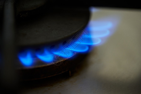 燃气炉 天然气燃烧的蓝火背景图片