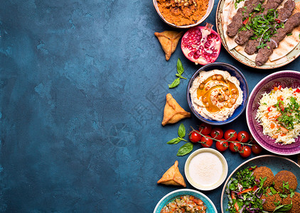 阿拉伯语盘子背景宴会框架蓝色派对环境餐厅羊肉桌子美食牛肉背景图片