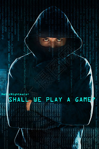 黑客海报素材他威胁着元数据 一个凶恶的计算机黑客 假扮在工作室内黑暗背景下的肖像背景