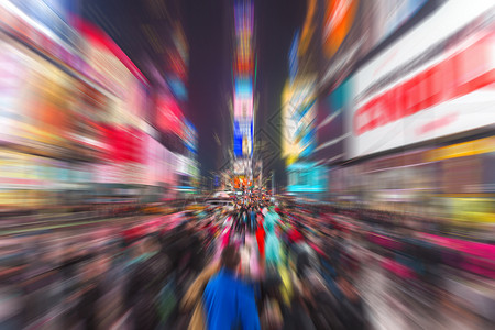 城市模糊夜景时报广场街夜景 街头艺术家与群众聚集在街上 运动效果模糊照片节日街道旅游人体旅行彩绘自由城市戏服背景