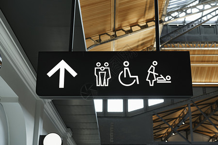 彩绘标签指示牌墙上现代公共厕所标志背景