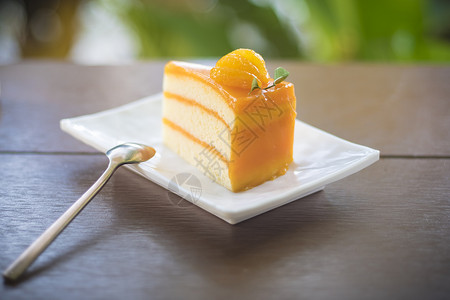 一碟蛋糕水果橙子果酱奶油蛋糕奶油食物小吃面粉小菜面包黄色美食橙子盘子背景