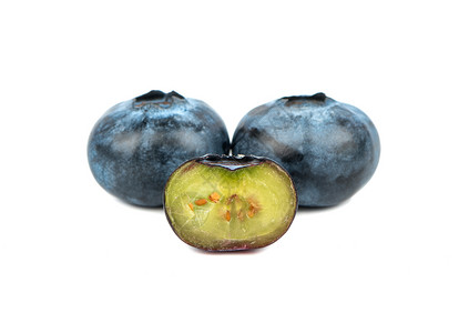 新鲜蓝莓和一半营养蓝色白色甜点水果团体浆果食物蔬菜覆盆子背景图片