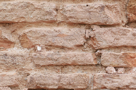 旧石砖墙的详细显示石板空白页岩黑色裂缝石膏框架花岗岩材料石工背景图片