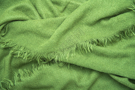 真丝围巾带边缘 自然背景和秋天时装配件的绿色绿绿围巾背景