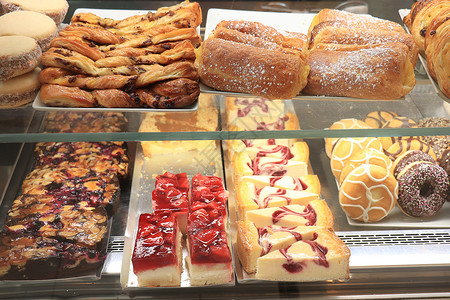 各种甜食品坚果店铺甜点黄色肉桂水果棕色美食市场糕点背景图片
