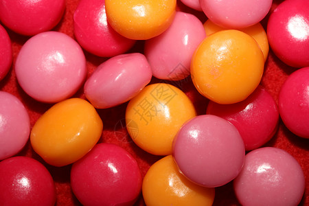 色彩多彩的圆形香味泡泡口香糖特写背景甜点气泡喜悦紫色赞成食物蓝色店铺乐趣软糖图片