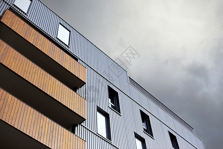 城镇现代化建筑城市住房房地产多云窗户阳台天空住宅公寓背景图片