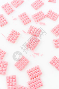 微型粉红巧克力食物甜点甜食糖果粉色手工背景图片