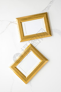 大理石上的金色相框 平面模型  装饰和模型平面概念网店摄影奢华样机框架艺术房间金子印刷品绘画背景图片