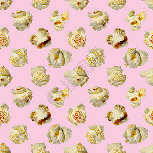 无缝模式爆米花 粉红色背景上的爆米花 图案流行音乐食物甜点玉米粉色背景图片