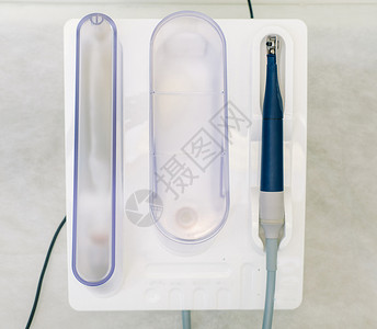 牙科办公室的超声波缩压器 牙科概念药品外科牙齿诊所卫生预防橡皮矫正机器打扫背景图片