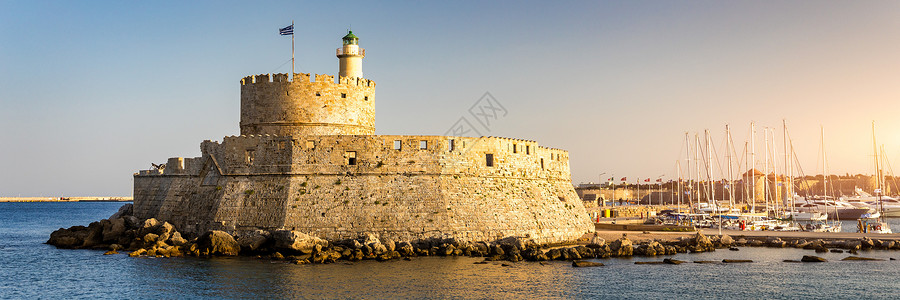 海城堡地方希腊罗得岛罗得岛老城的全景 与海港的圣尼古拉斯堡垒都市风景在 希腊罗得岛的旅游目的地建筑学堡垒城堡雕像地标入口港口地方文化青铜背景