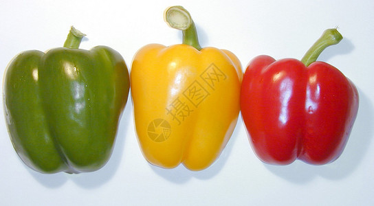 红 黄和绿色甜辣椒背景图片