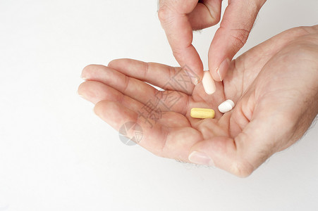 服用药物的人维生素健康医疗药片药品治疗背景图片
