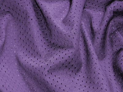 折叠的紫色织物背景图片