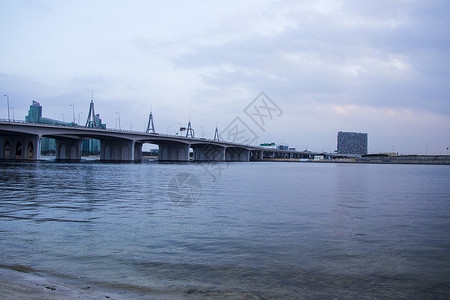 阿联酋户外迪拜一座称为商业湾桥的桥梁景象天空太阳全景旅行记录假期寒意天气支撑风暴背景图片