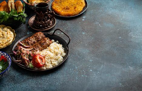 土耳其土族传统食物午餐火鸡家庭桌子烧烤炙烤蔬菜美食盘子送货背景图片
