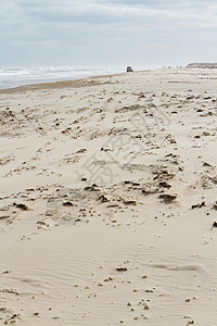 海滩假期游客运输材料海岸线越野岩石颗粒矿物卡车背景图片