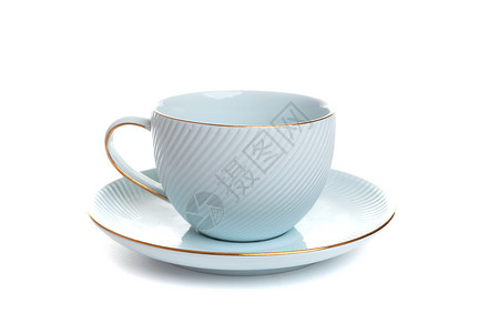 蓝色陶瓷碟子蓝色茶杯 用白色孤立背景的碟子泡茶背景