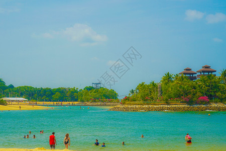 新加坡Sentosa度假胜地海滩波浪状远距离景点白色观光蓝色海岸沙滩旅行旅游背景图片