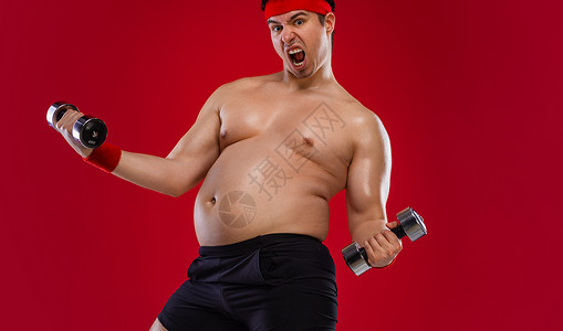 p图胖子素材胖子和哑铃一起锻炼 阿图利特被红色背景隔绝背景