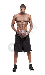 一个英俊的年轻篮球运动员 站在工作室里站着一无是处肌肉大块头调子运动训练成人男性运动装腹肌膀子背景图片
