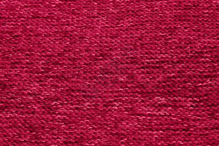 色调单色纹理针织面料 深粉色针织泽西岛作为纺织背景 单色背景 羊毛针织质地 流行色 2023风格流行材料织物针织品万岁毛衣套衫纤背景图片