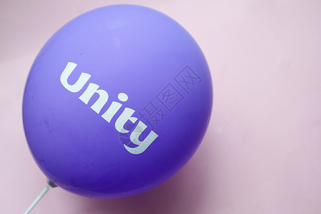 紫色球上的整齐文字团队力量联盟团结圆圈背景图片