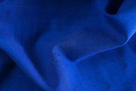 家具装饰织物的质地 深褶皱顶视图中的耐磨防水面料 蓝色织物纹理特写顶视图窗帘亚麻材料纺织品横幅地毯质量墙纸白色棉布背景