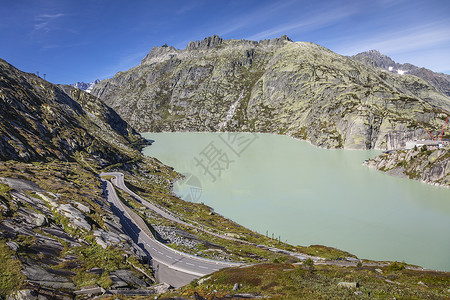 加乌拉山口瑞士的Oberalp山口高山湖天空山峰水库蓝色天堂风景爬坡目的地假期山脉背景