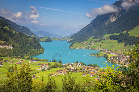 长白山国际度假区瑞士瑞士阿尔卑斯山的松石隆肯西和村庄肺部 瑞士教会草地帆船房子假期村庄目的地国际地标地方背景
