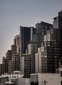 翻天覆地的城市摩天大楼的建筑风景反射场景建筑学背景财产吸引力房地产天空纹理旅行背景