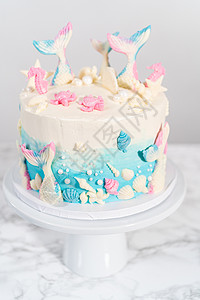 人鱼贝壳素材3层香草蛋糕的美人鱼人鱼糖霜主题甜点糕点食物奶油糖果尾巴蛋糕背景