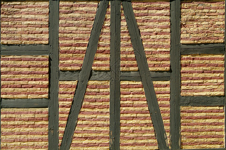 旧砖墙的详情木头条纹建筑学红色黄色棕色背景图片