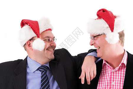 圣诞派对欢乐帽子朋友们朋友季节商务微笑男性乐趣友谊成人背景图片