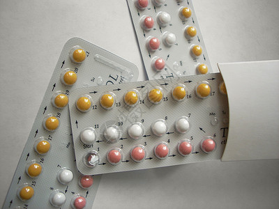 平板图口服红色药品荷尔蒙黄色处方药片白色药物剂量背景图片
