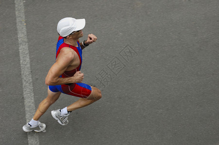跨线男人远距离慢跑赛车竞赛行动竞技穿越铁人耐力背景图片